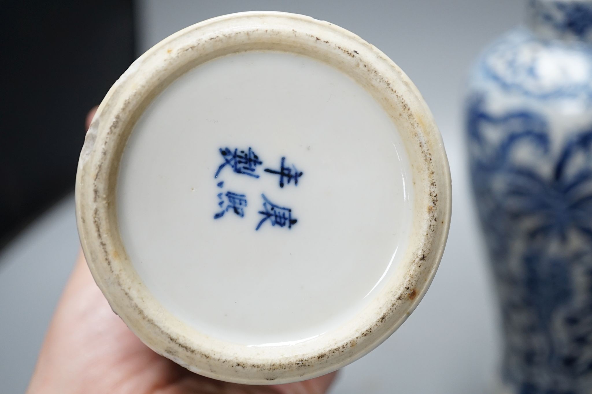 A pair of Chinese blue and white dragon vases and covers, circa 1900. 28cm